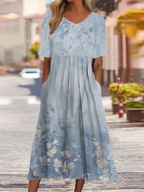 SpringStil® - Blue midi dress with short sleeves and print