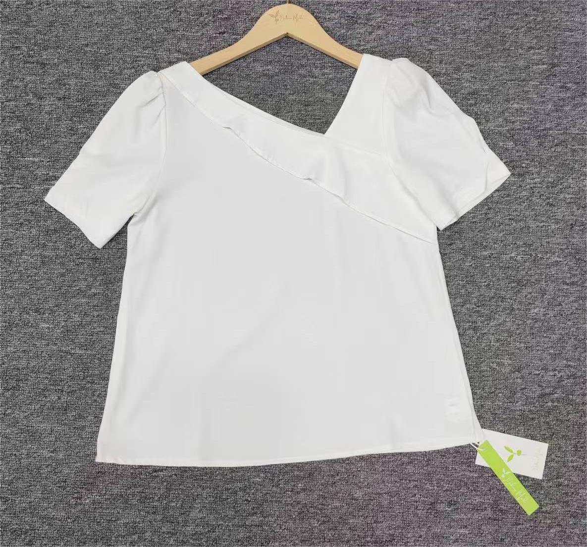 FallStil® - Solid white puffed short sleeve asymmetric top