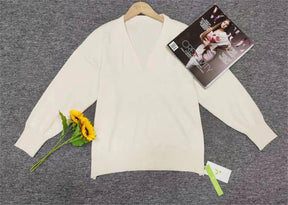 WinterStil® - Apricot colored plain V-neck sweater