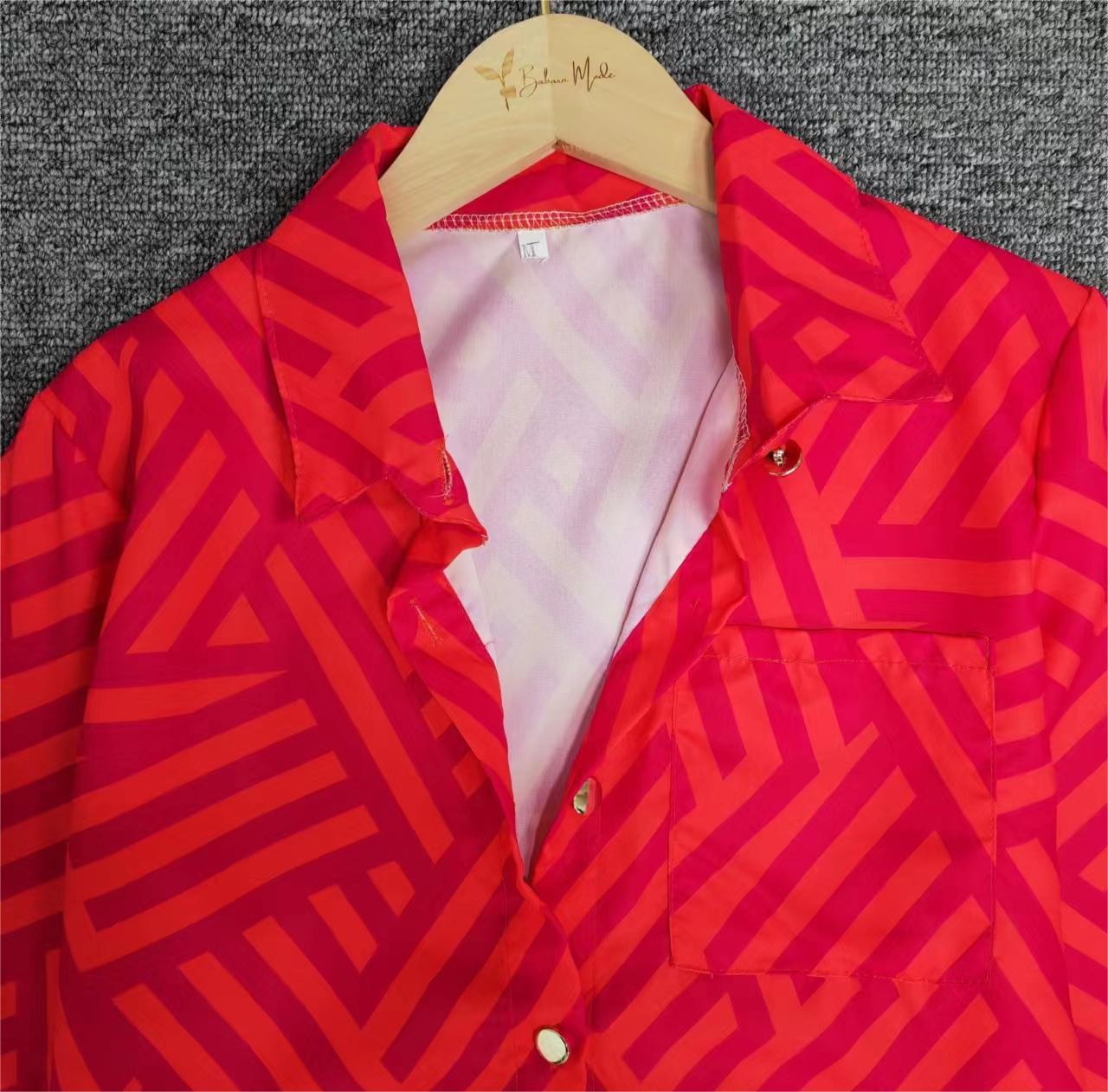 FallStil® - Pink and orange blouse with zigzag stripes and button placket