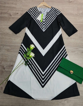 Naturlux® - Black and white striped midi dress with side pockets for sailors