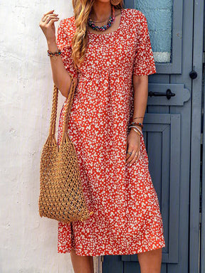 BioBlüte® - Blütenrausch a red midi dress with floral details