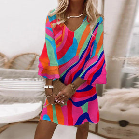 Naturlux® - Multi-coloured mini dress with curved stripes and bell sleeves