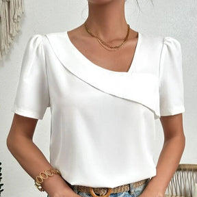 FallStil® - Solid white puffed short sleeve asymmetric top