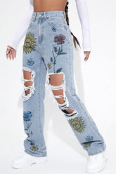 Vintage graphic denim ripped