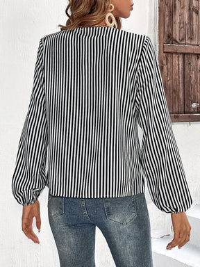 FallStil® - Ruffled black and white striped long sleeve top